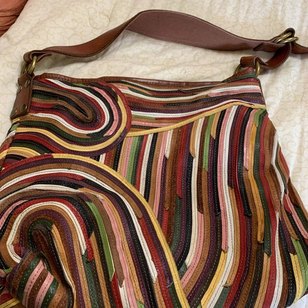 Lucky multi color leather hobo handbag.